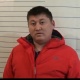 МАИчини унаасынын капотунда сүйрөп кеткен айдоочу кармалып, милициянын суроолоруна жооп берди