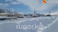 Чаткалга жааган калың кардан улам тургундарга азык-түлүк жөнөтүлдү