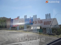 Таш-Көмүрдө Исхак Раззаковдун сөзүнүн үстүнө партиялардын жарнамалары илингени тургундарды нааразы кылууда