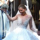 Swarovski ишканасынын мураскери Викториянын үлпөт көйнөгү 46 килограммды түздү