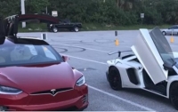 Tesla электро унаасы Lamborghini спорттук унаасын басып өттү