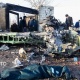 Тегеранда кулаган учактан каза болгондордун дене мүчөлөрүн 2 гектар аянттан топтоп жатышат