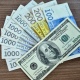 Доллардын улуттук валютага карата баасы 80 сомго жакындады