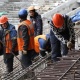 Москва бийлиги курулушта иштеген мигранттардын санын кыскартат