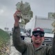 АКШда унаа жолун акча басып калды (видео)