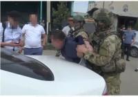 1500 доллар талап кылганга шектелип Ош ШИИБинин ыкчам кызматкери кармалды